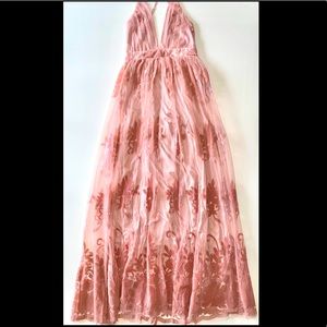 Gorgeous blush gown. Perfect for summer events! This piece was gently worn once